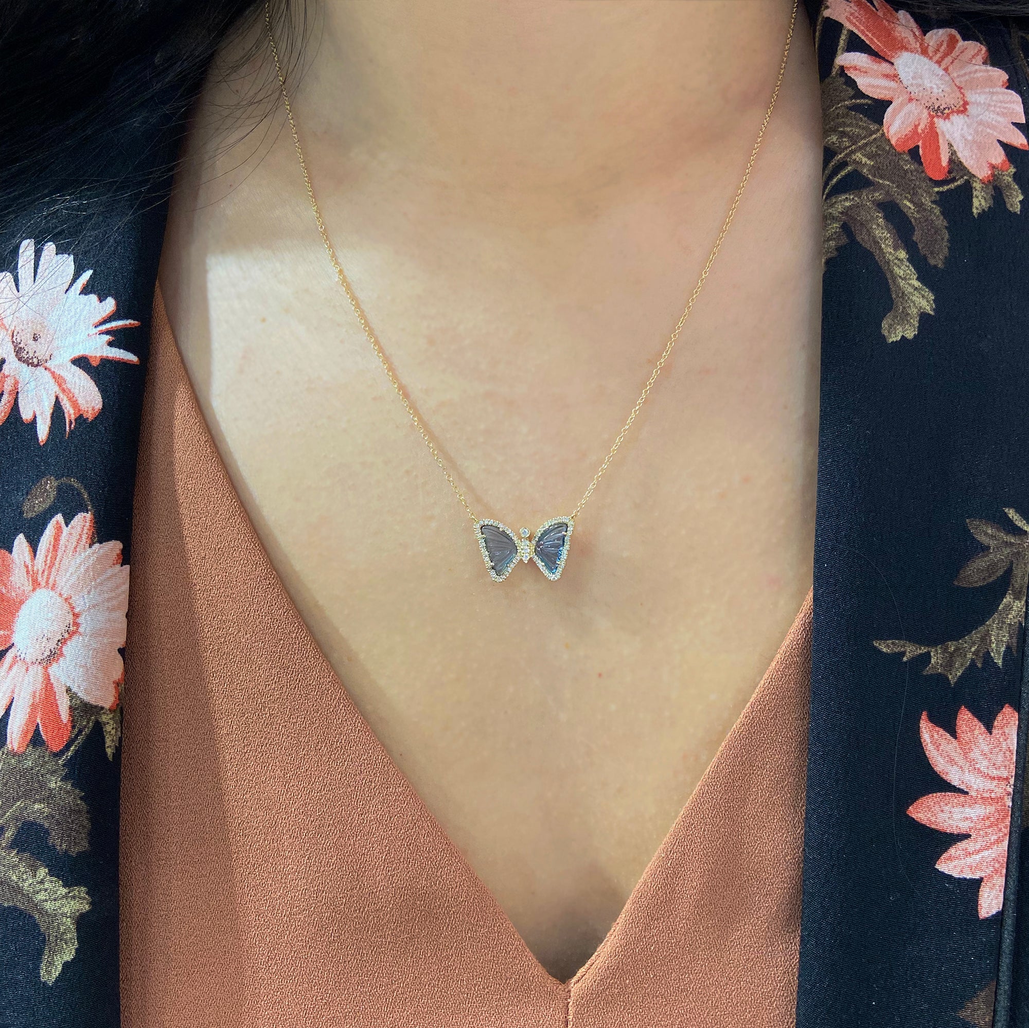 mini butterfly necklace with diamonds in london blue topaz