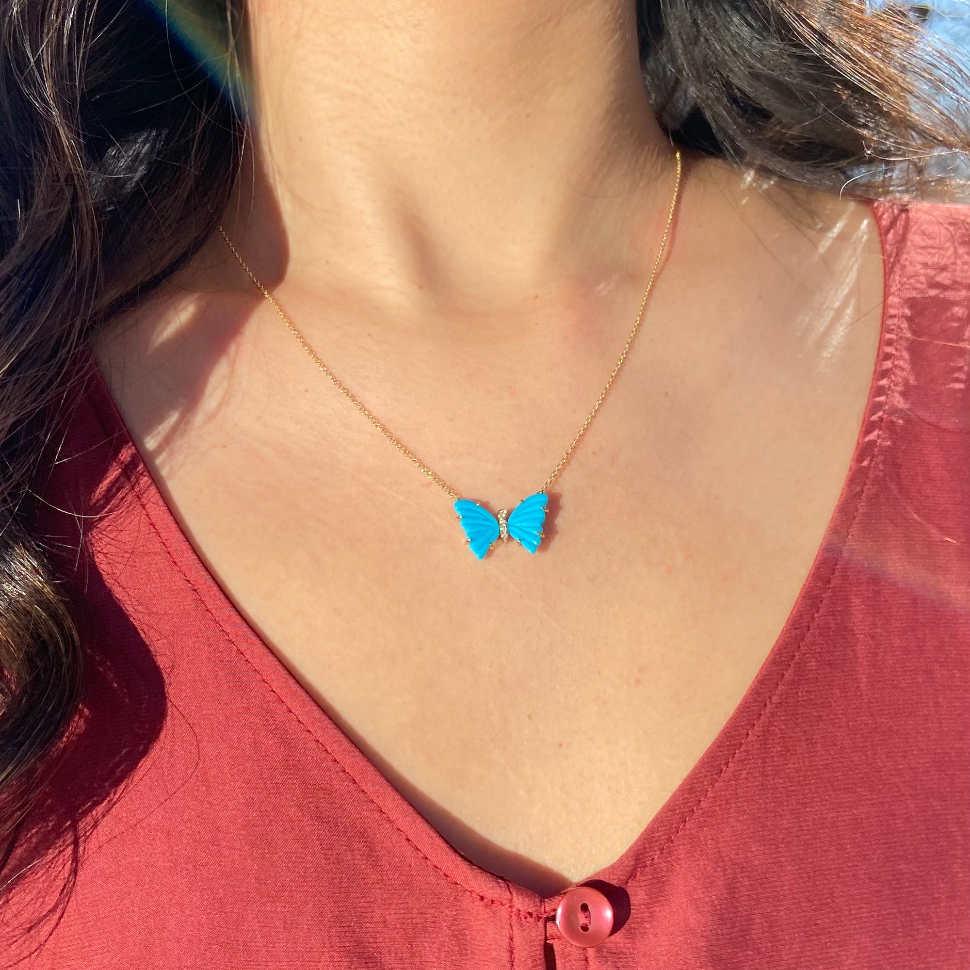 mini pronged butterfly necklace with diamonds in turquoise