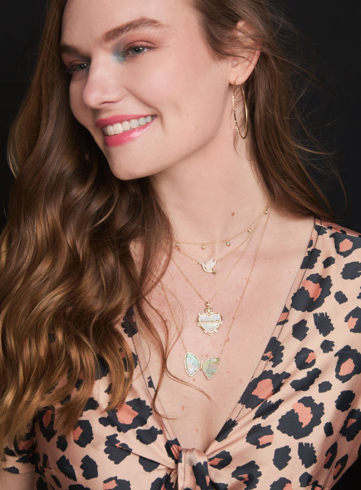 large sacred heart necklace with pearl layered butterfly bird and opal choker