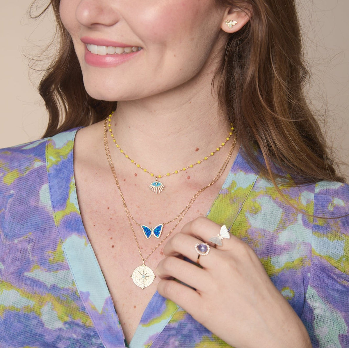 kamaria layered necklaces butterfly evil eye compass