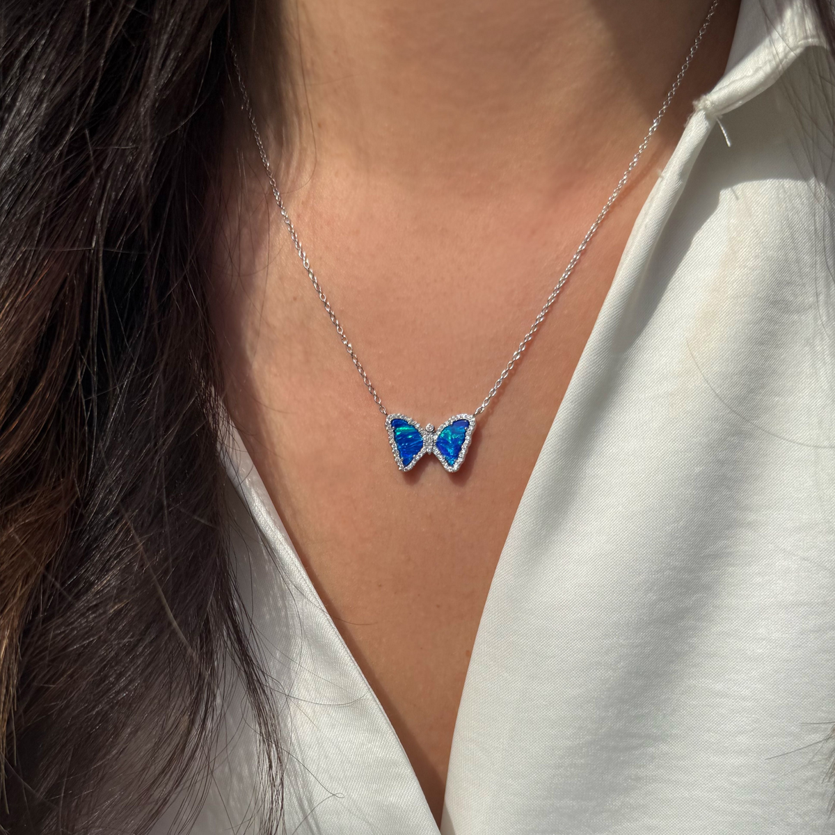Mini butterfly necklace with opal in indigo opal silver