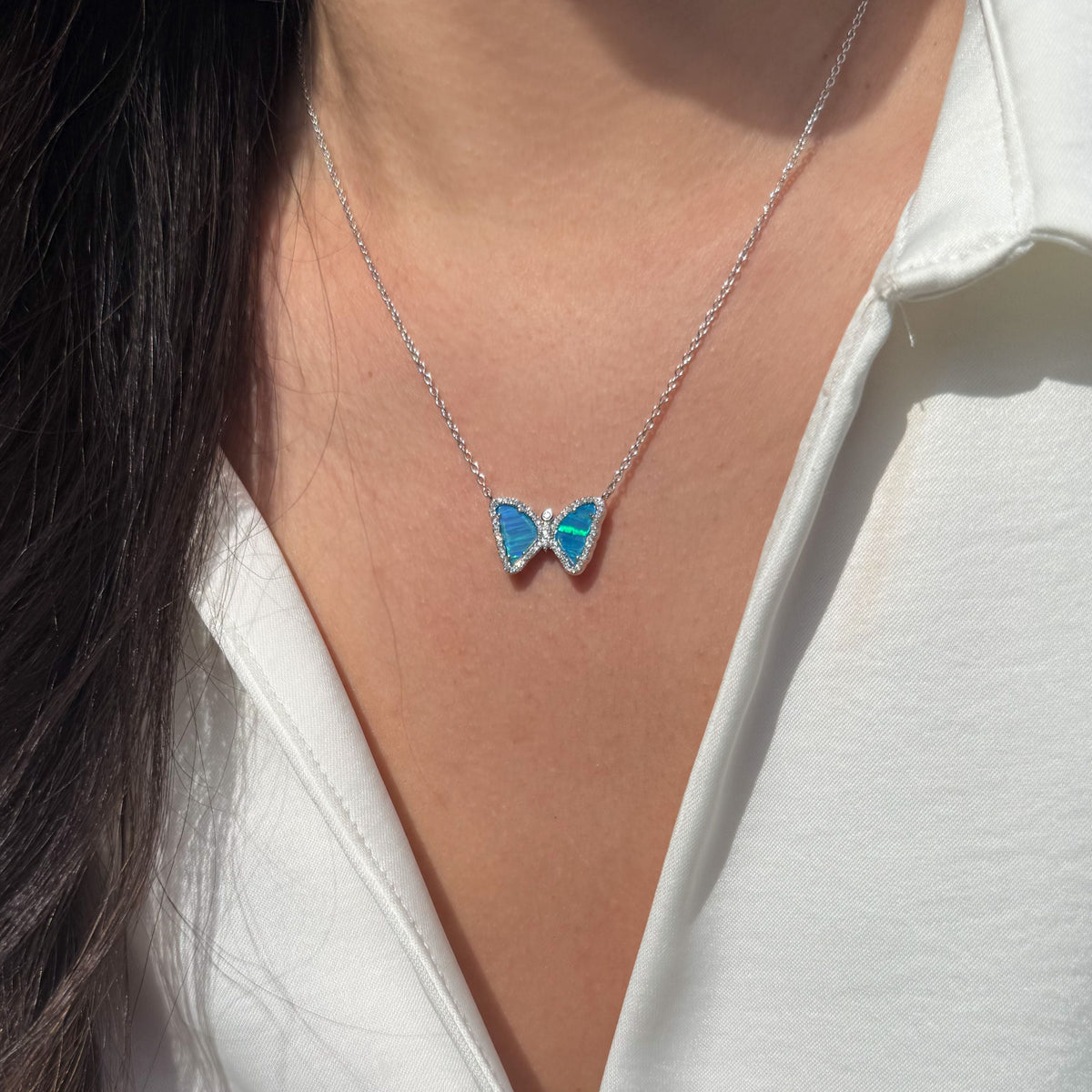 Mini butterfly necklace with opal in blue green opal silver