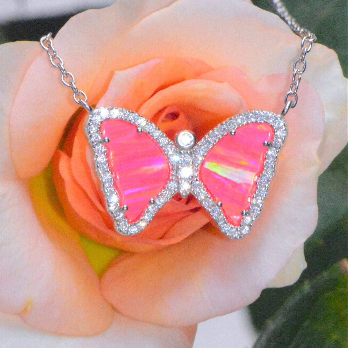 Mini butterfly necklace with opal in hot pink opal silver