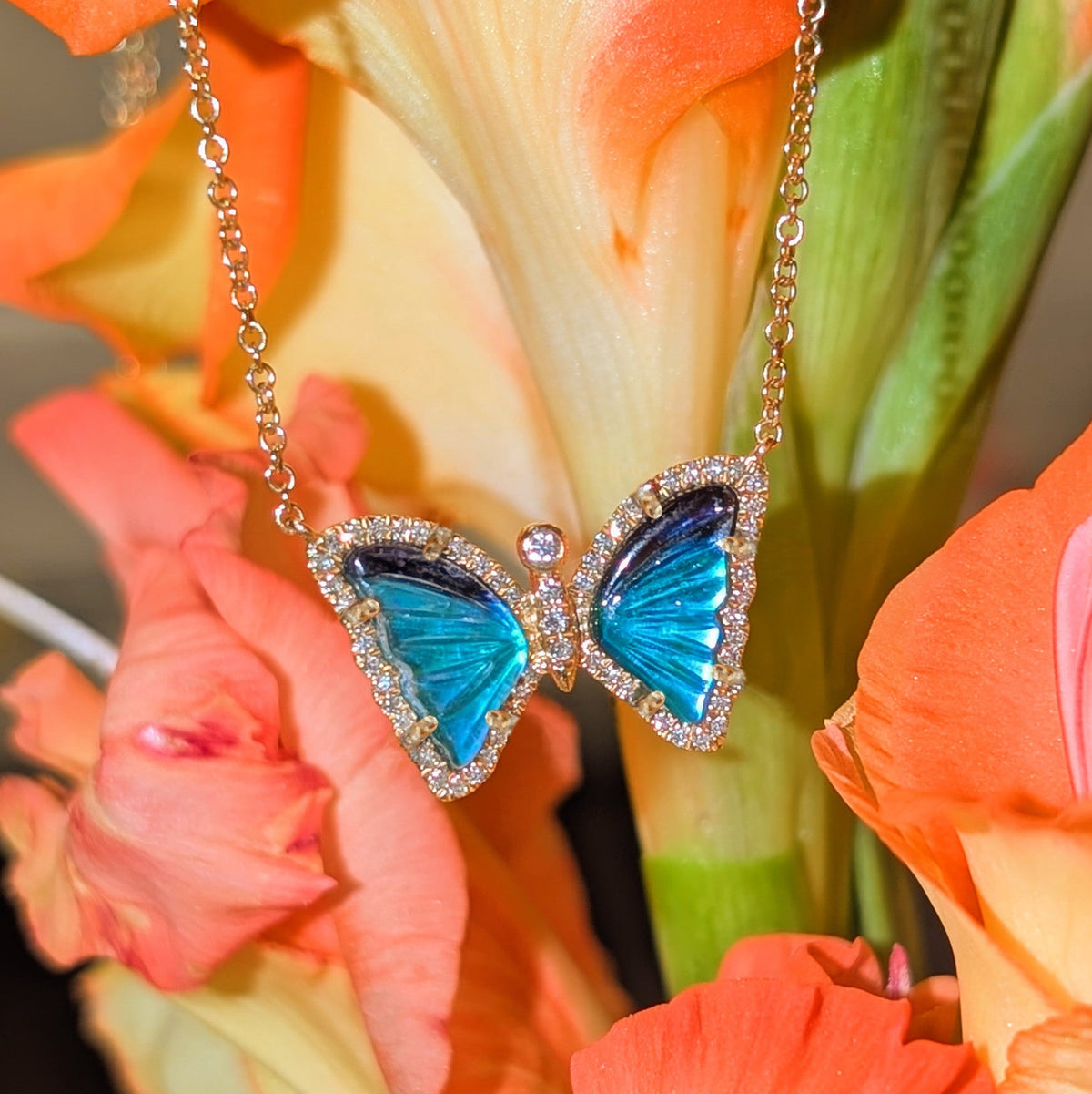 Mini black blue and green cat eye butterfly necklace with diamonds