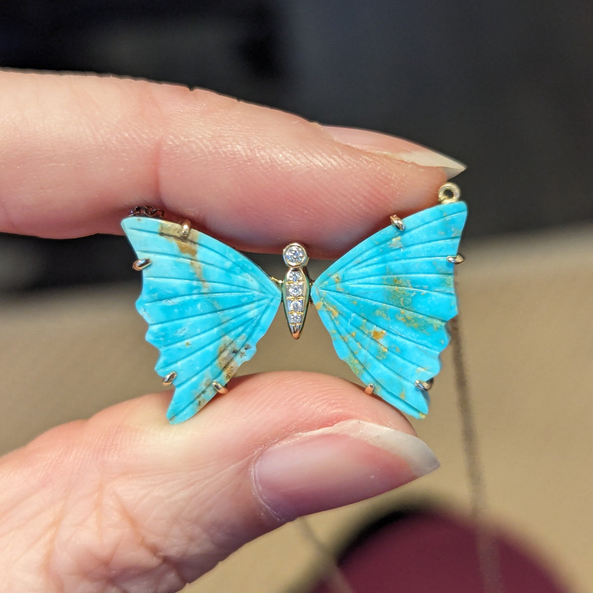 large turquoise butterfly necklace with prongs and diamonds