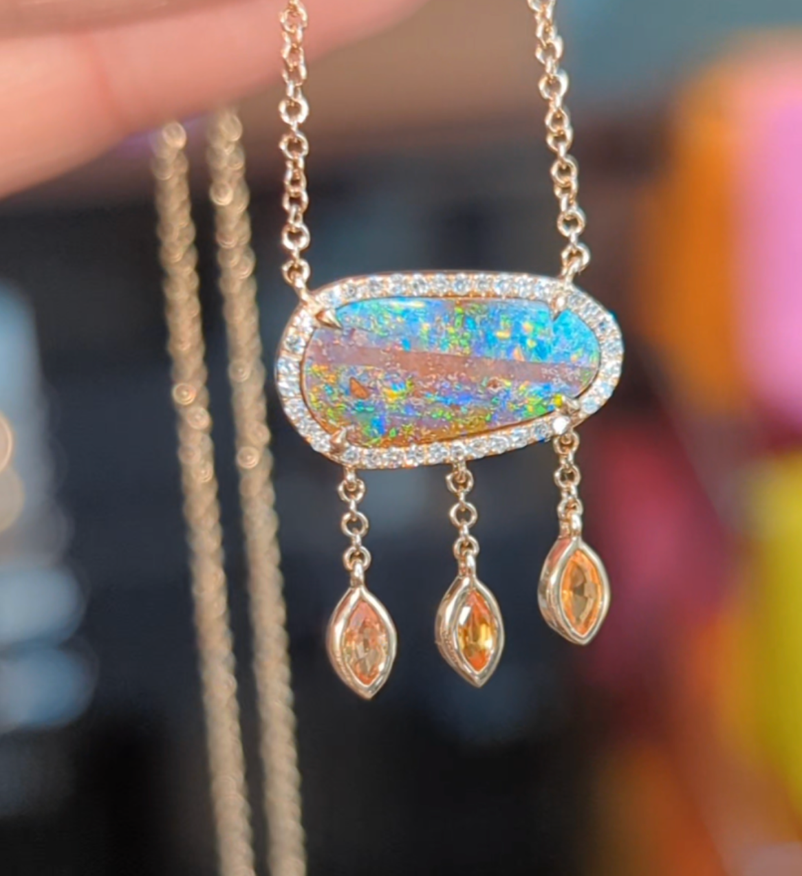 boulder opal necklace with marquise sapphire drops and diamonds