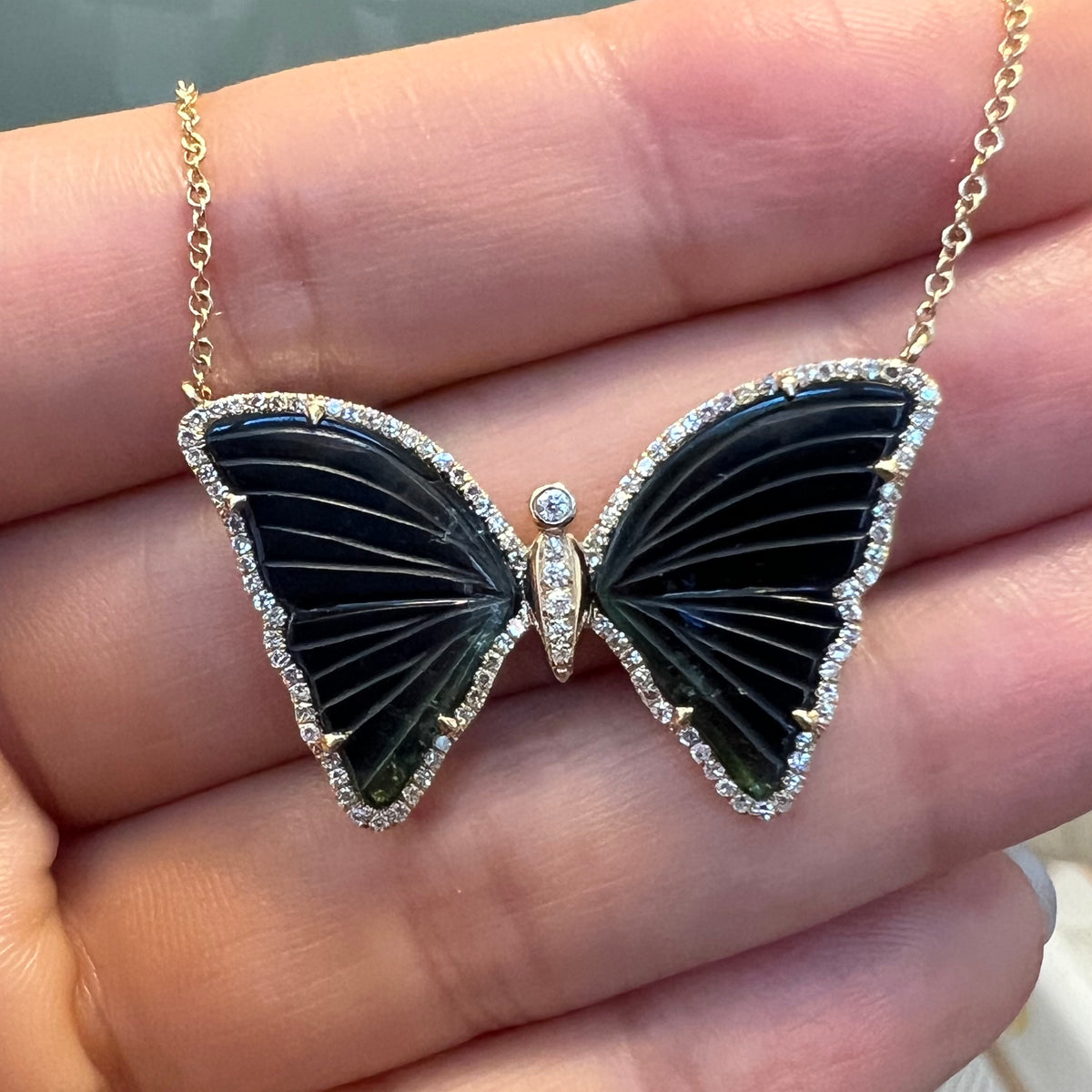 black dark navy and deep green tourmaline butterfly necklace with diamonds