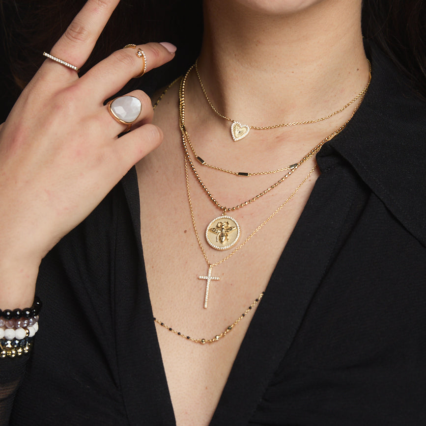 kamaria layered gold necklaces queen bee medallion