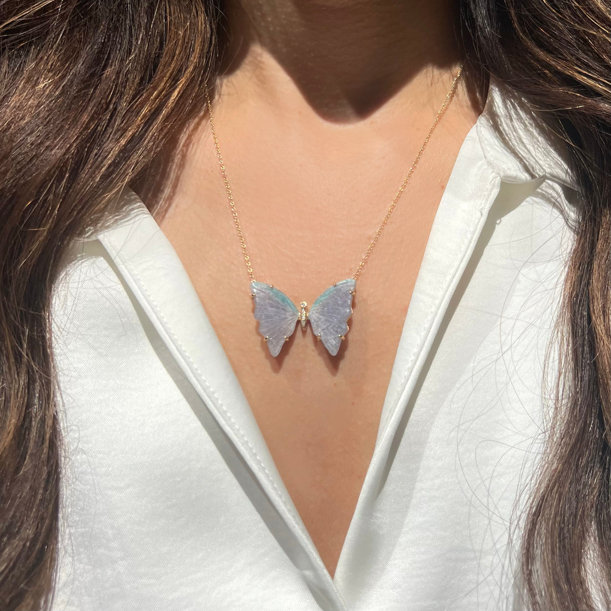 large paraiba tourmaline butterfly necklace with prongs