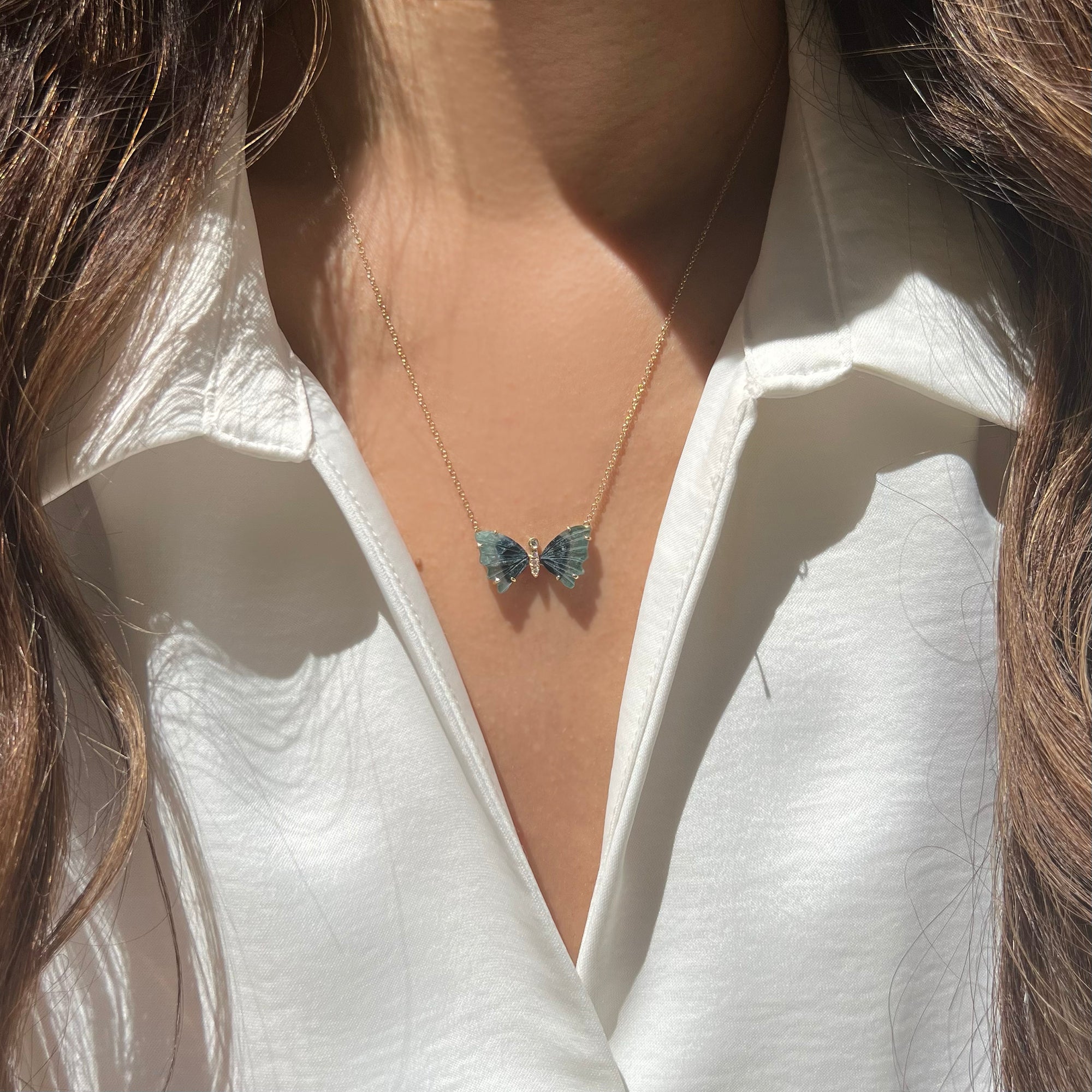mini blue and navy butterfly necklace with diamonds pronged
