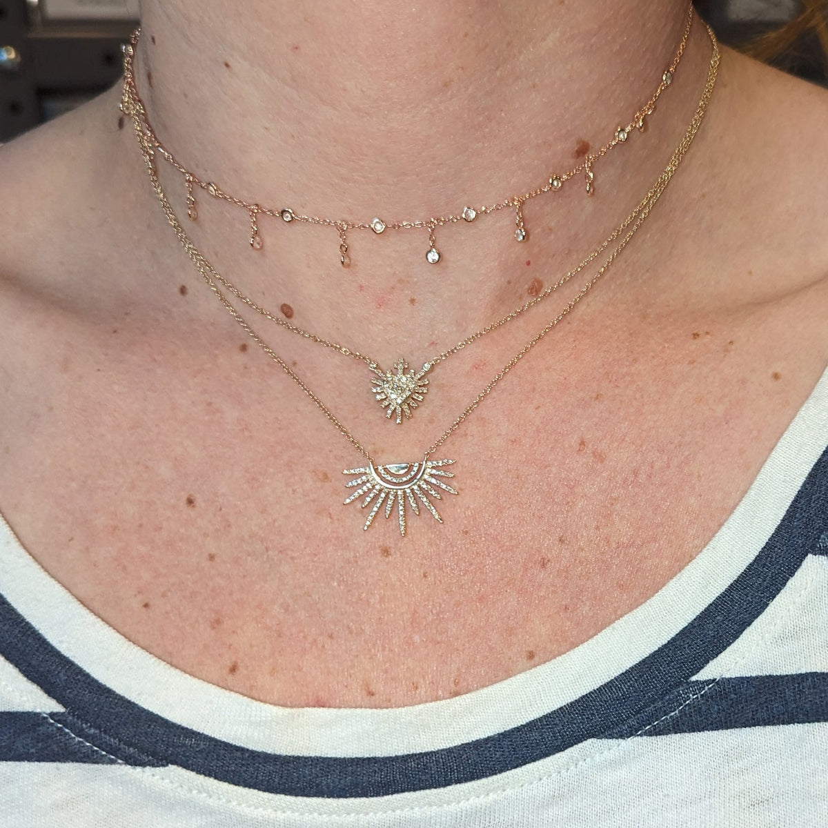 mini sacred heart and sunset necklaceSunset necklace with diamonds in 14k rays