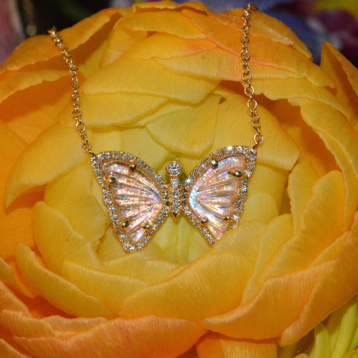 mini sunlight butterfly necklace peach with diamonds