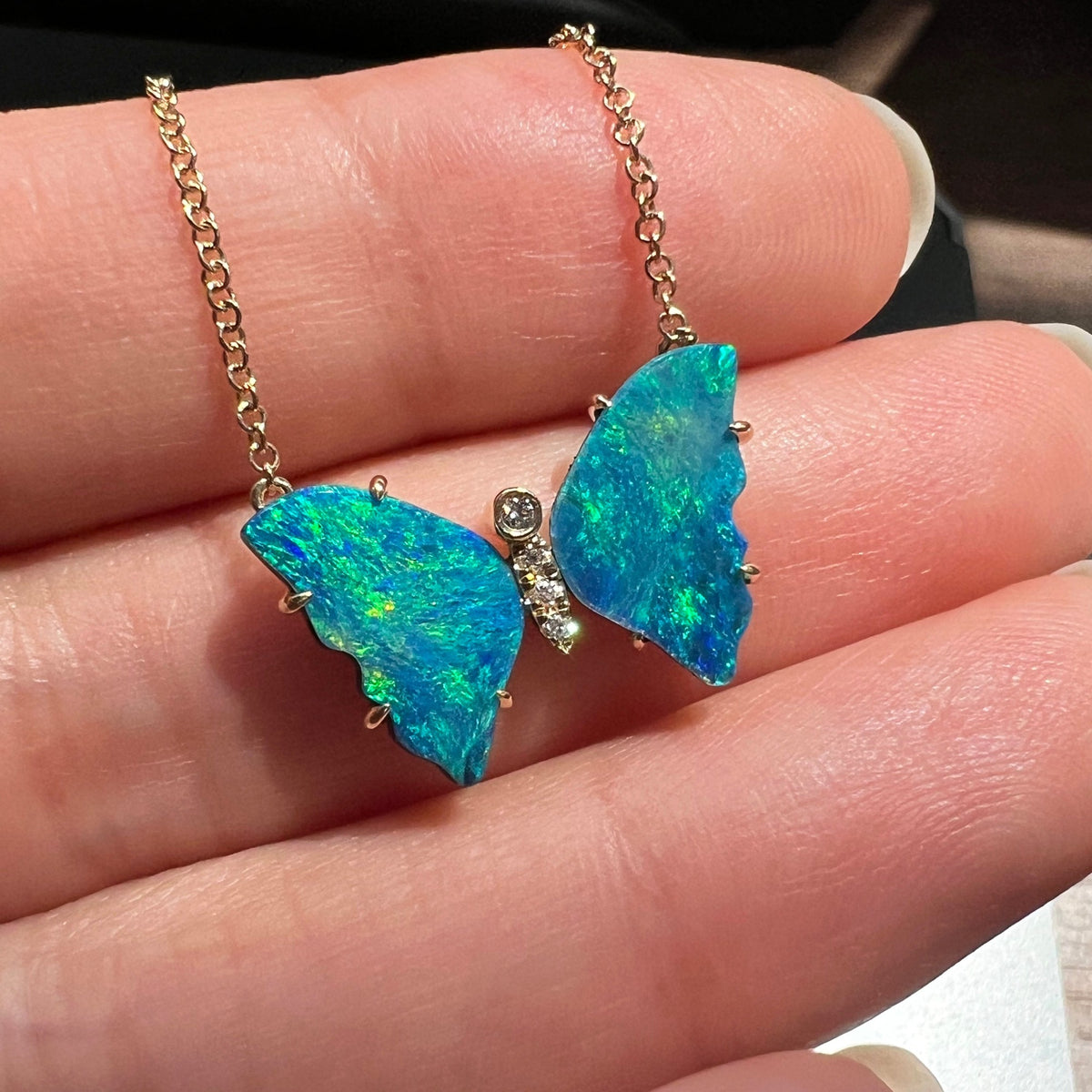 Mini pronged butterfly necklace boulder opal rainbow