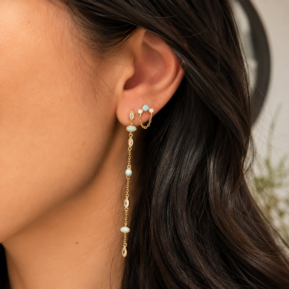 opal drop earrings falling blossoms linked in light