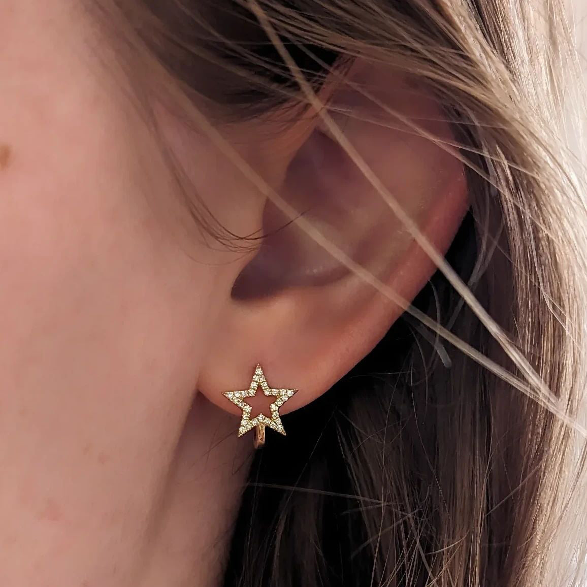 open star diamond huggie earrings in gold
