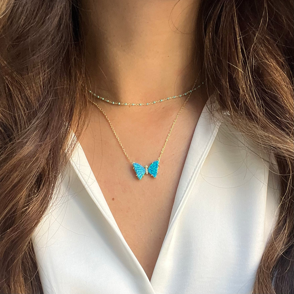 opal butterfly necklace with prongs blue green opal