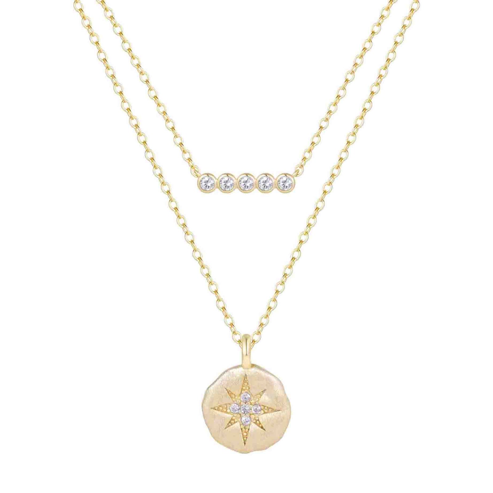 Gold necklace with star pendant and small round pendant on a white background