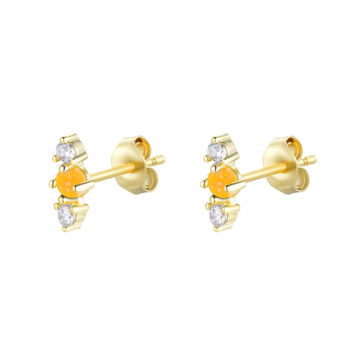 Gold earrings with orange stones on a white background