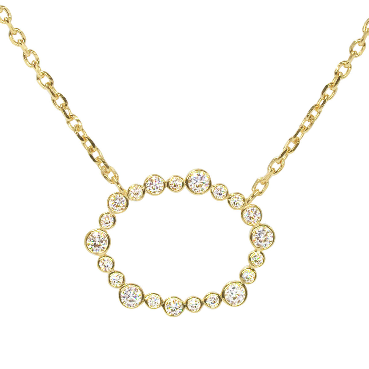 A sterling silver oval constellation necklace with round high-quality crystals set in a circle pattern, with an adjustable chain.
