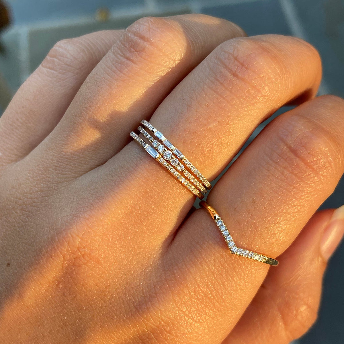 thin diamond stacking rings in 14k gold