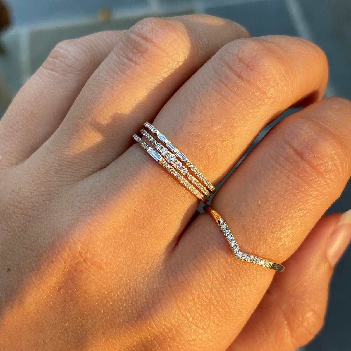 thin diamond stacking rings in 14k gold