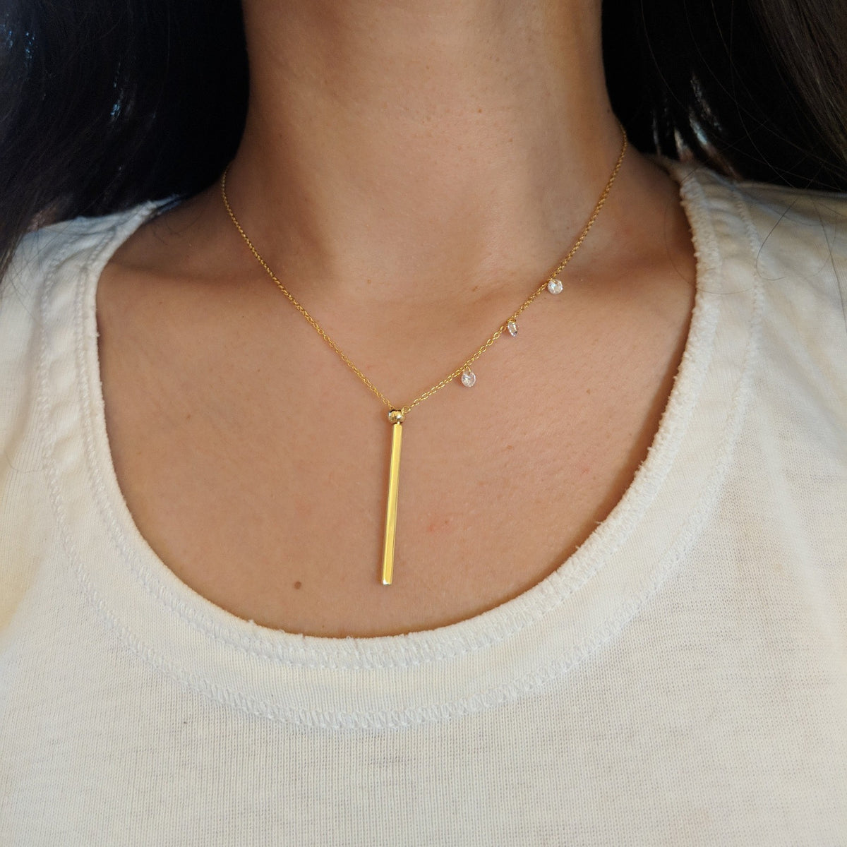double slider lariat necklace in gold as a pendant