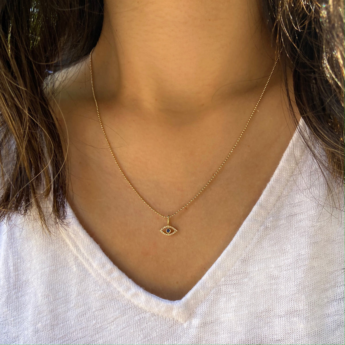 Evil eye and blue sapphire necklace on ball chain