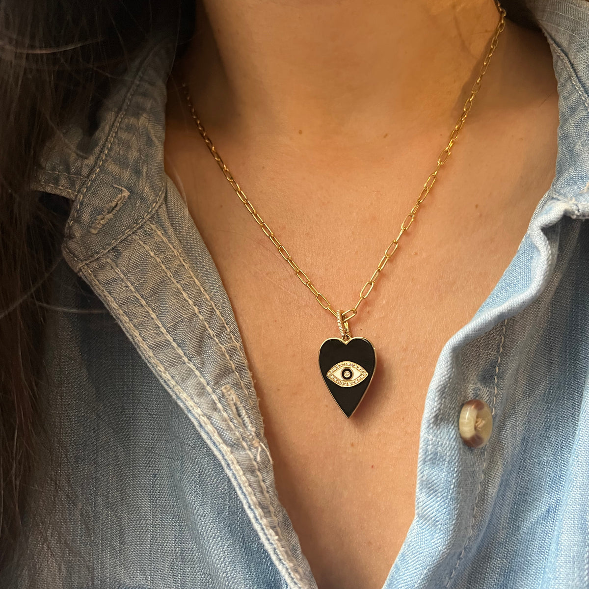 large black enamel evil eye heart necklace on paperclip chain