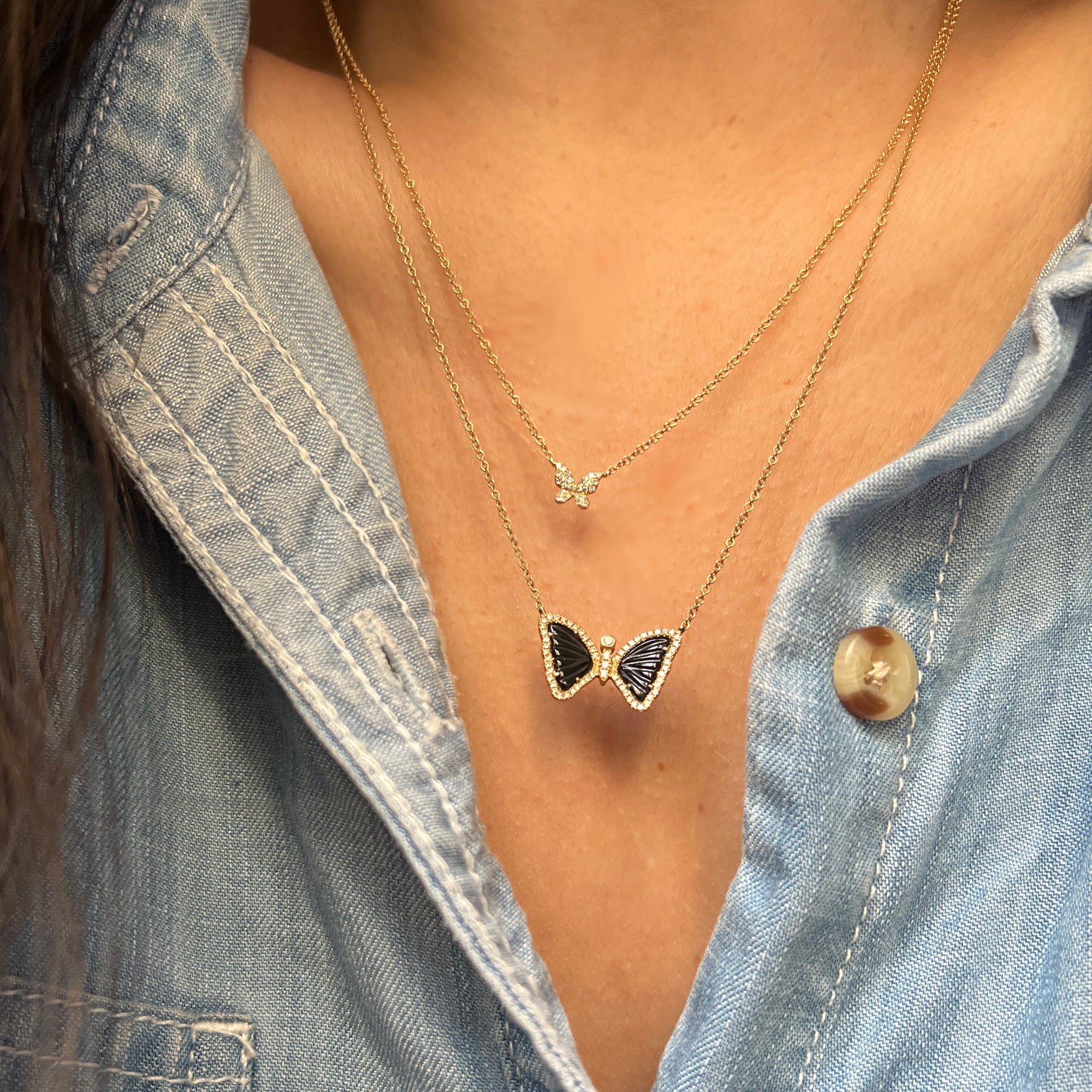 mini butterfly necklace with diamonds in 14k gold