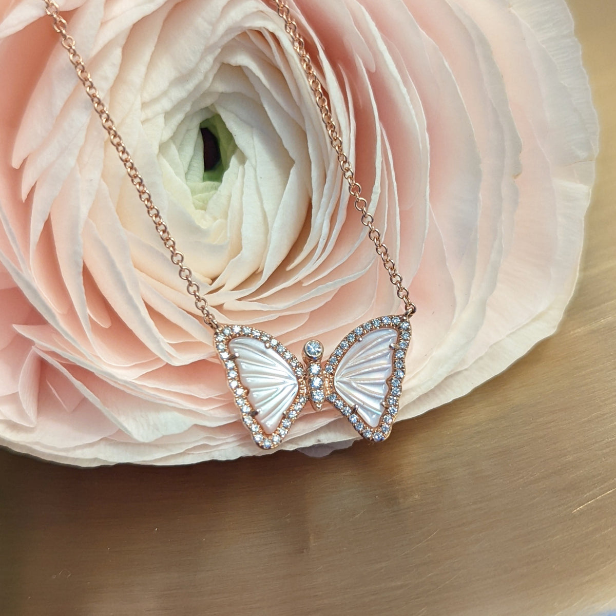 mini butterfly necklace with diamonds in pink mother of pearl