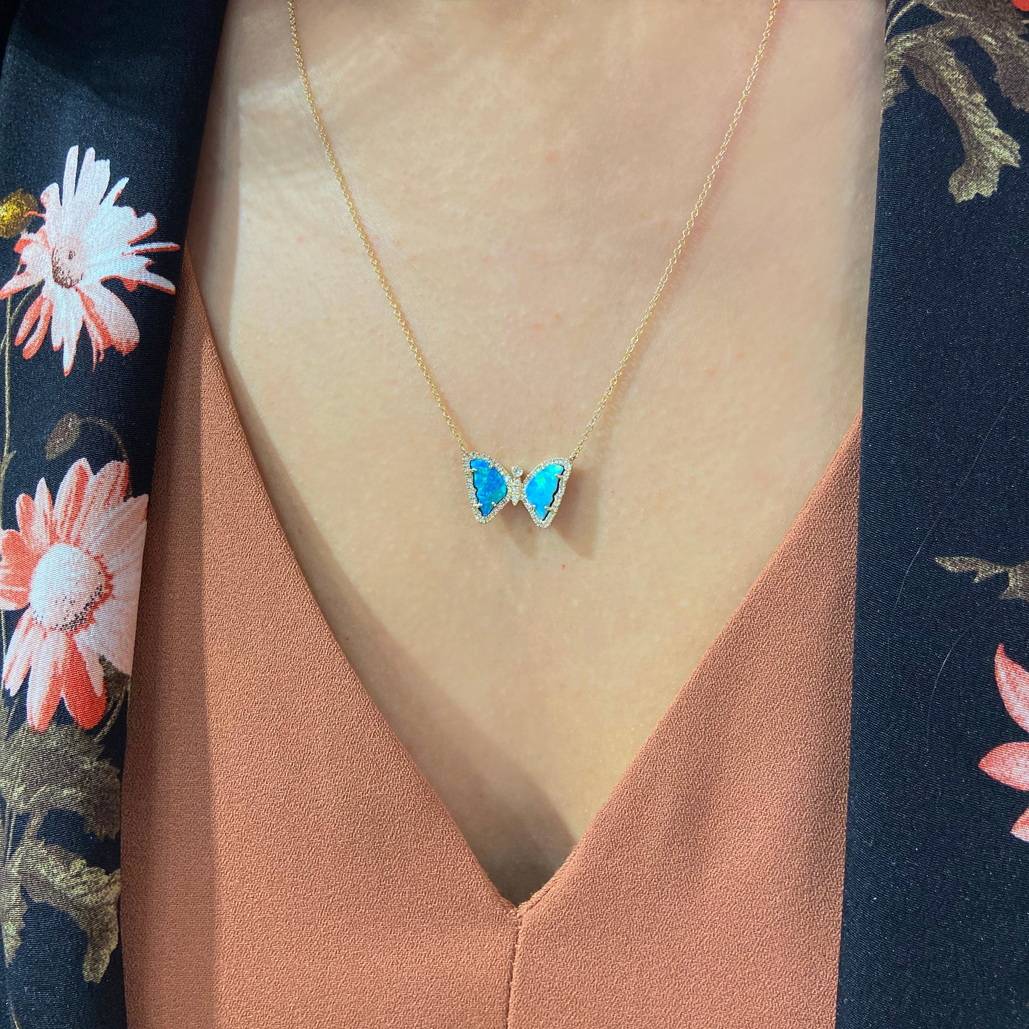 mini opal butterfly necklace with diamonds in 14k gold