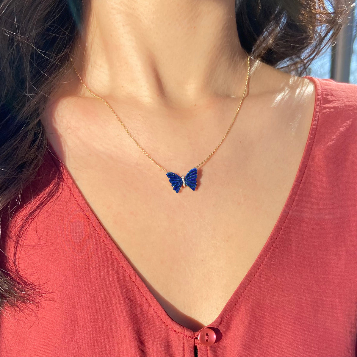 mini pronged butterfly necklace in blue lapis pronged lifestyle