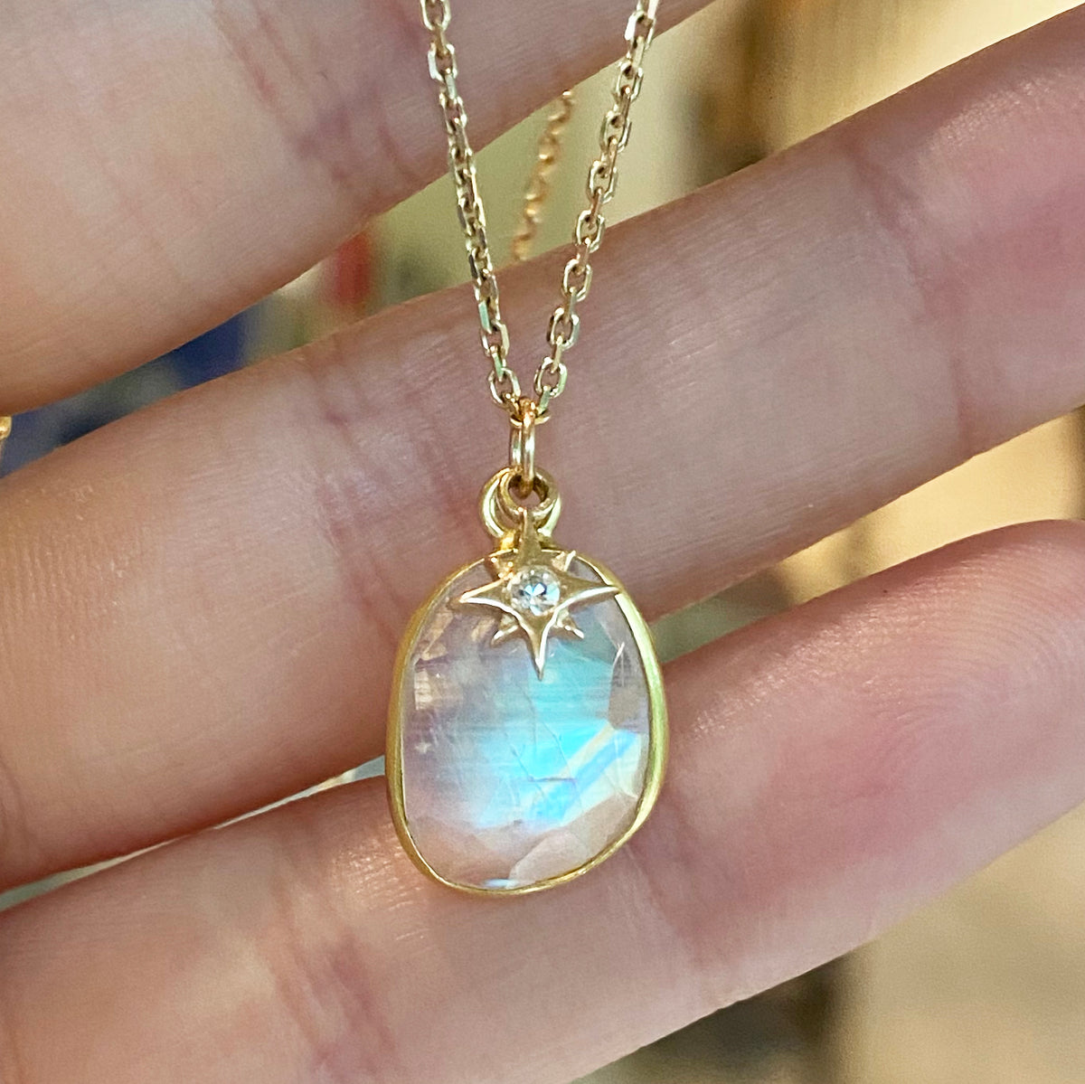 moonstone and diamond star charm necklace lifestyle
