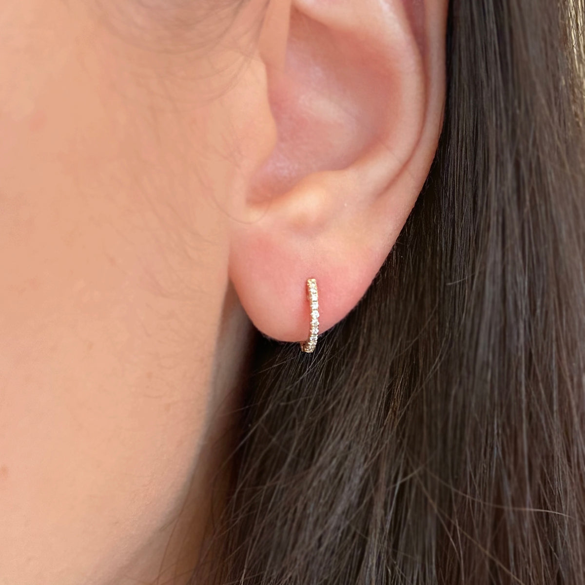Thin Diamond Huggie Earrings in 14k Gold Lifestyle