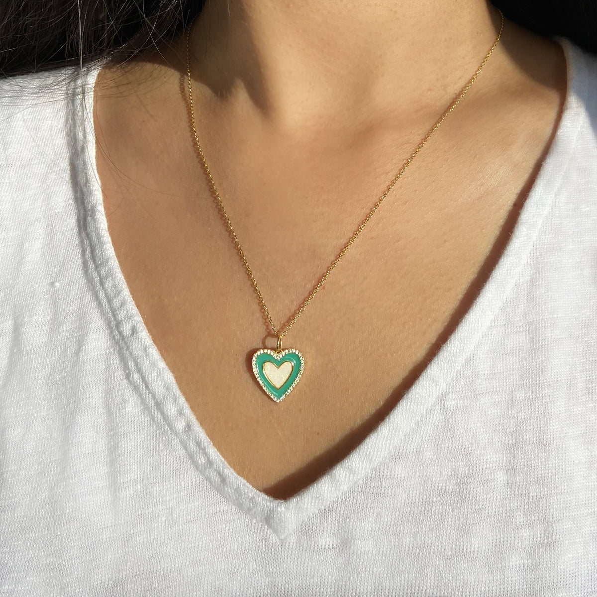 two toned heart necklace with turquoise enamel and white opal